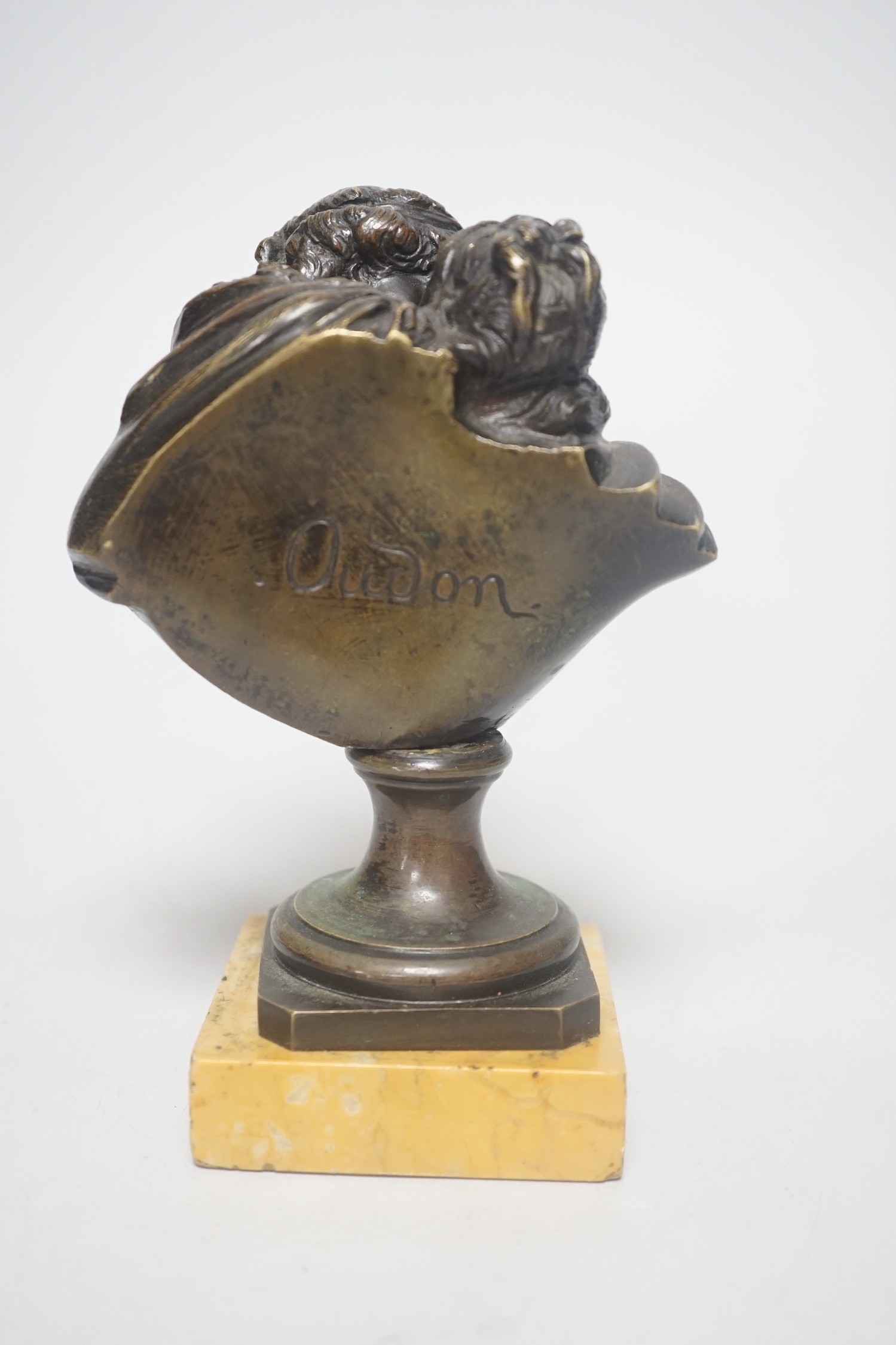 After Jean-Antoine Houdon (1741-1828), 'Le Baiser Donné' (The Kiss Bestowed], a 19th-century patinated bronze figure group, on a square Siena marble base, 16cm tall